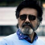دانلود آهنگ معین ( ورژن هوش مصنوعی ) به نام به همه دنیا می ارزه